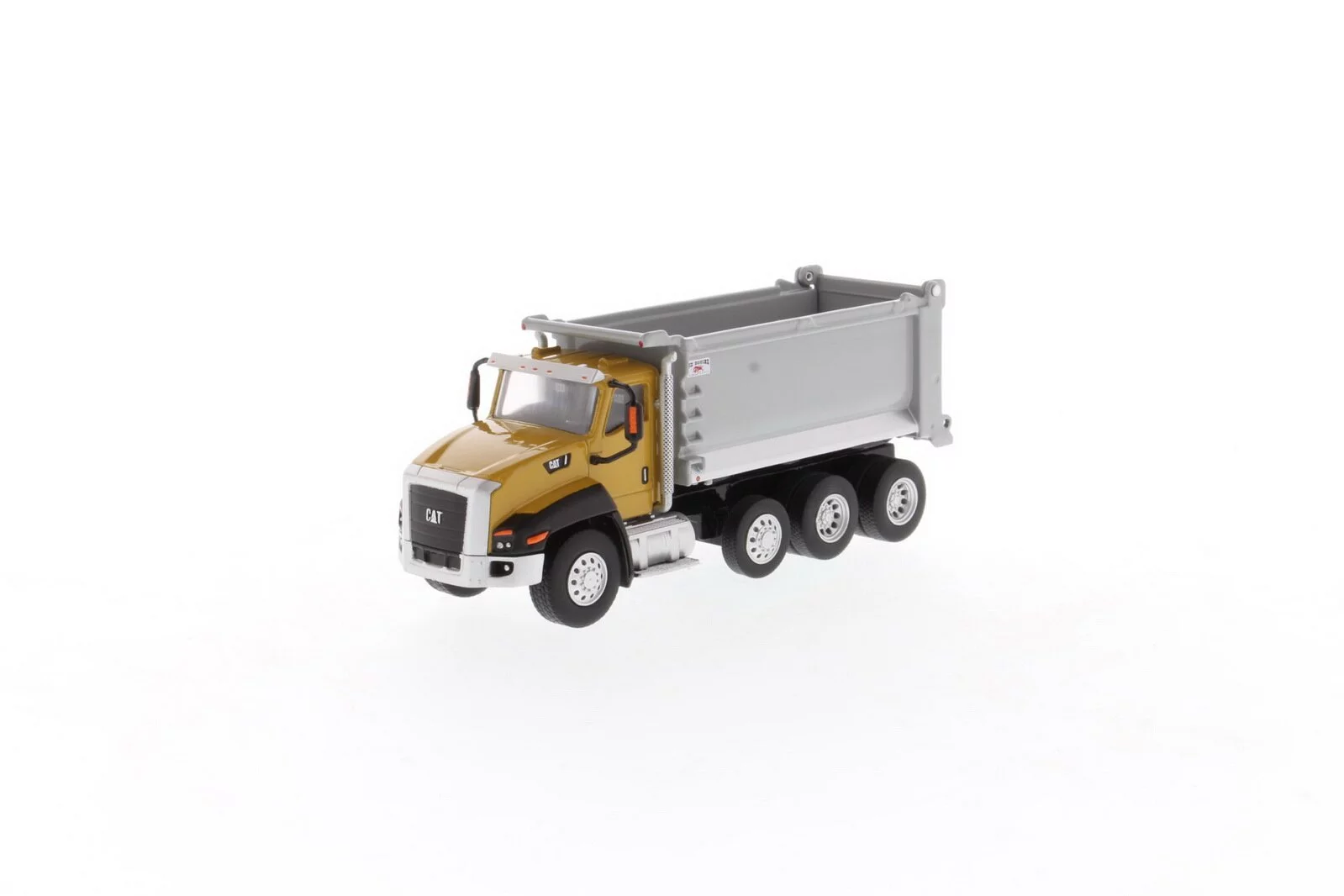 Camión volquete Caterpillar CT660 OX a escala 1:64 –Diecast Masters